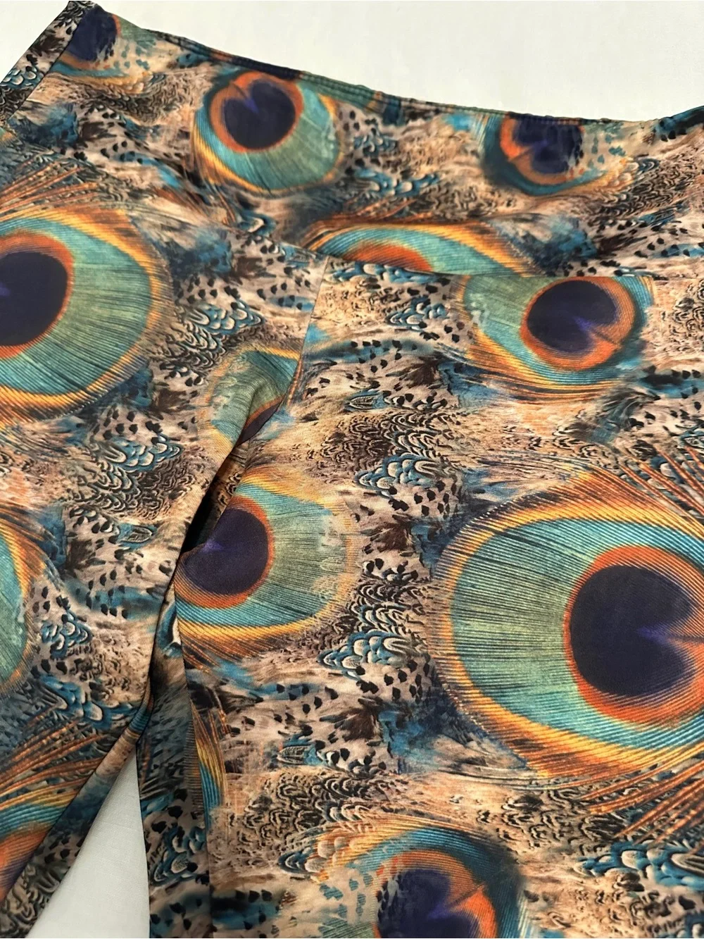 Onzie Peacock Feather Print Leggings in Teal, Gold & Navy - Picture 3 of 5